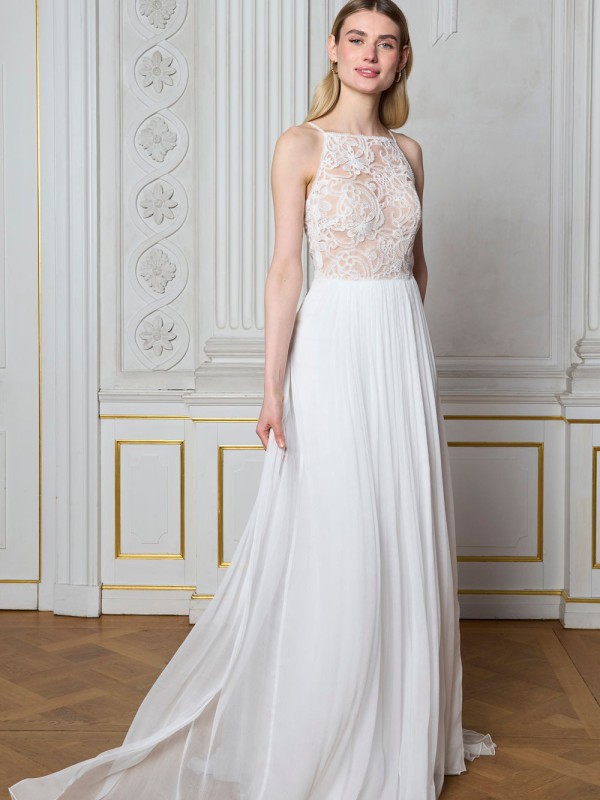 Romantisches Neckholder Brautkleid mit transparentem Spitzenoberteil und fließendem Tüllrock für eine zarte Silhouette